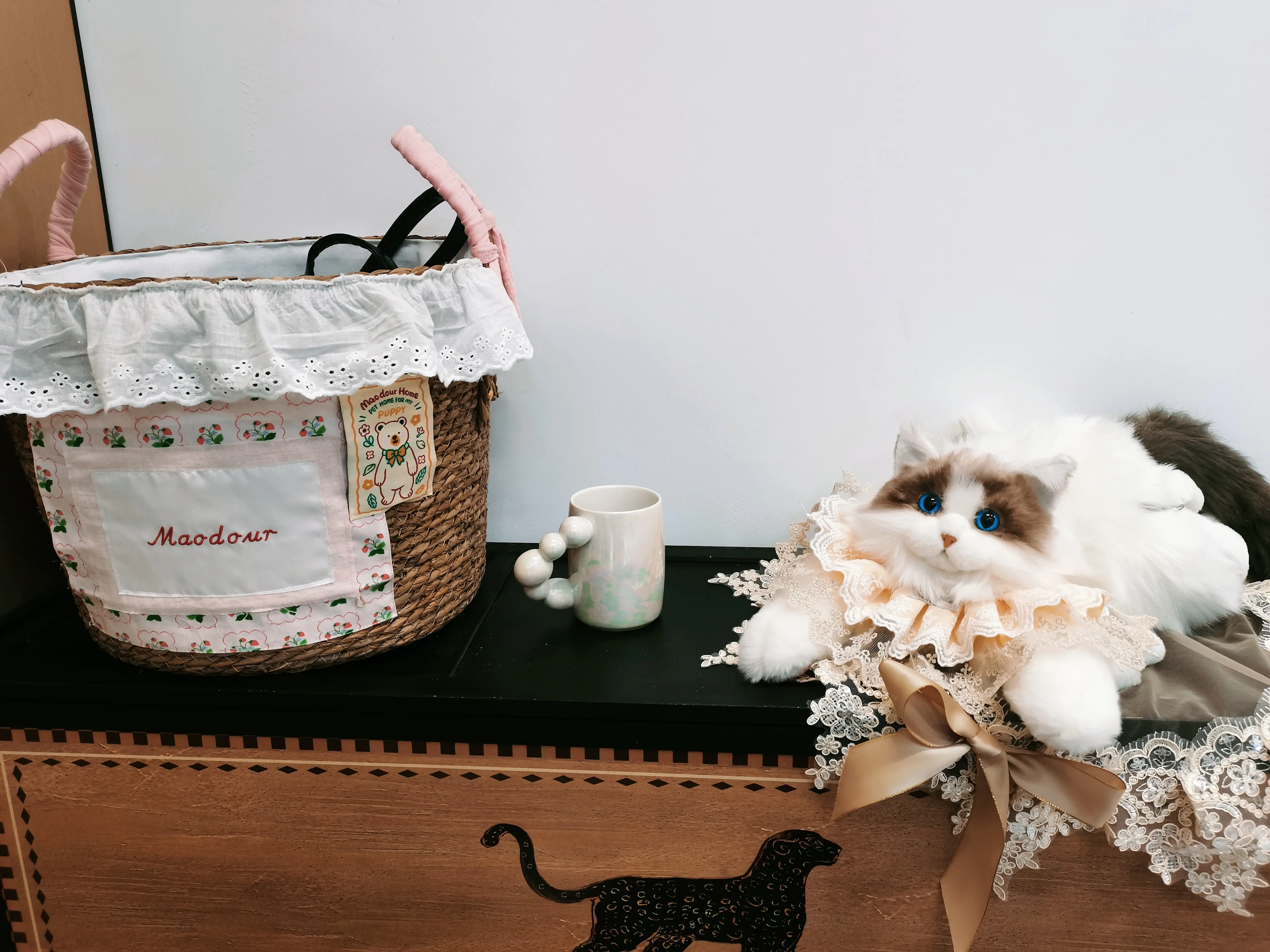 wooden storage basket for pet toys in a customer's home - Bear Pet Storage Basket